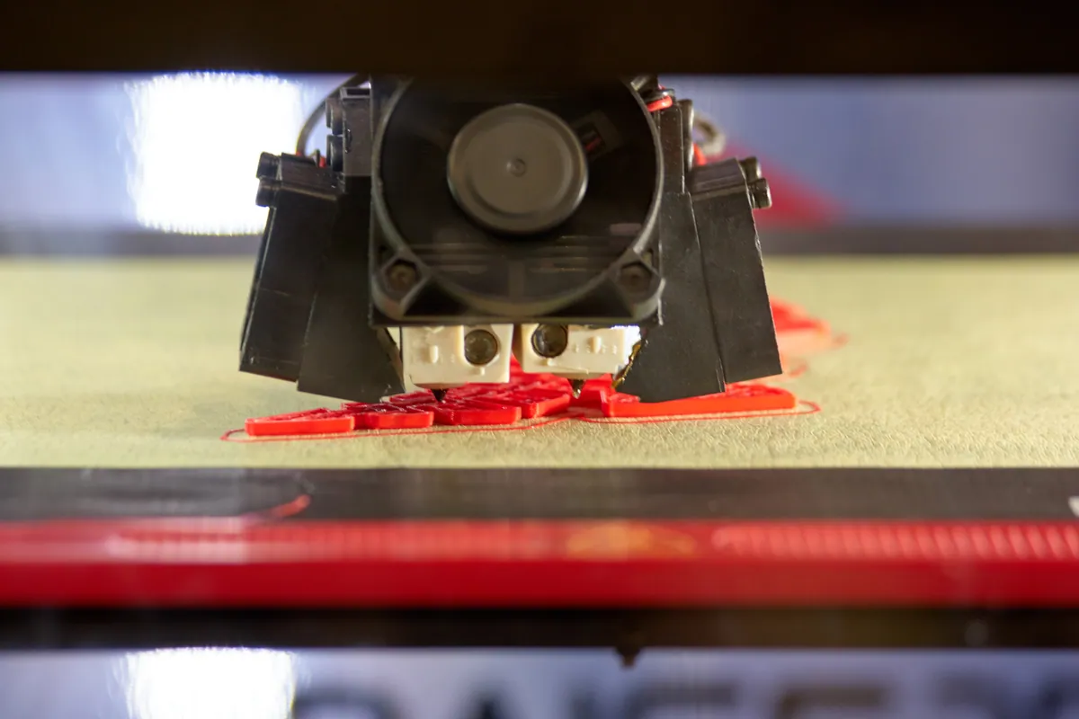 A 3D printer producing a detailed part