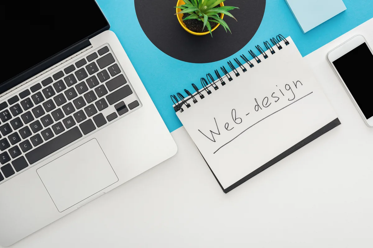 Top-down laptop workspace for a MacBook reset workflow guide