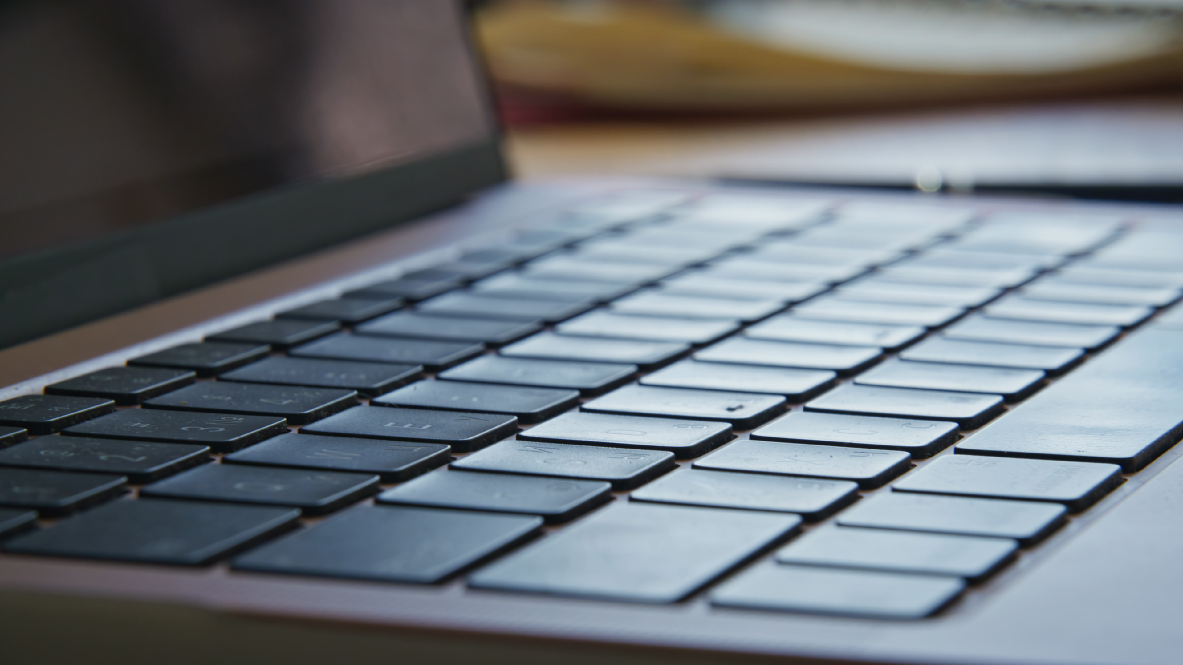 Laptop keyboard being inspected during repair