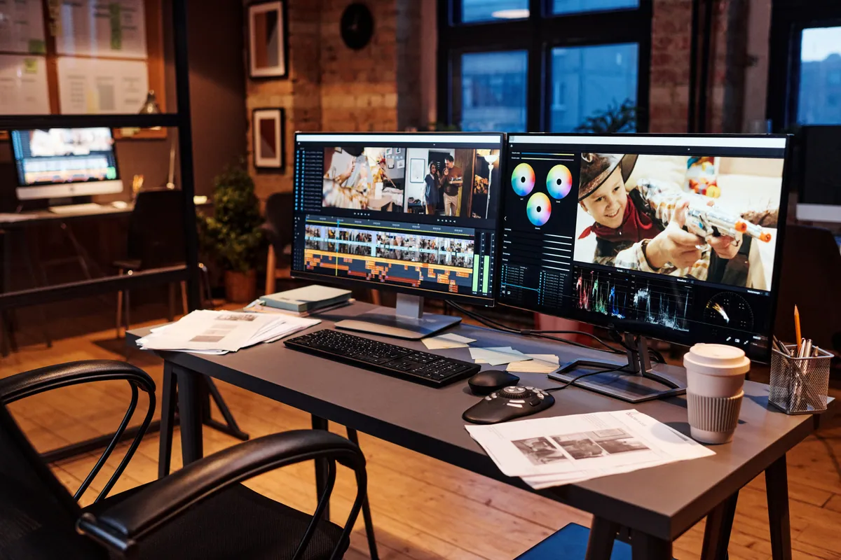 A desktop computer set up and running at a workspace
