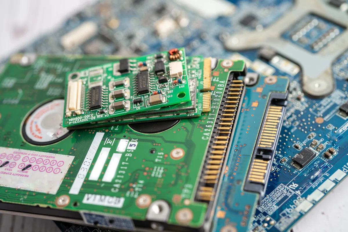 Close-up of a computer circuit board during a no-power logic-board diagnosis